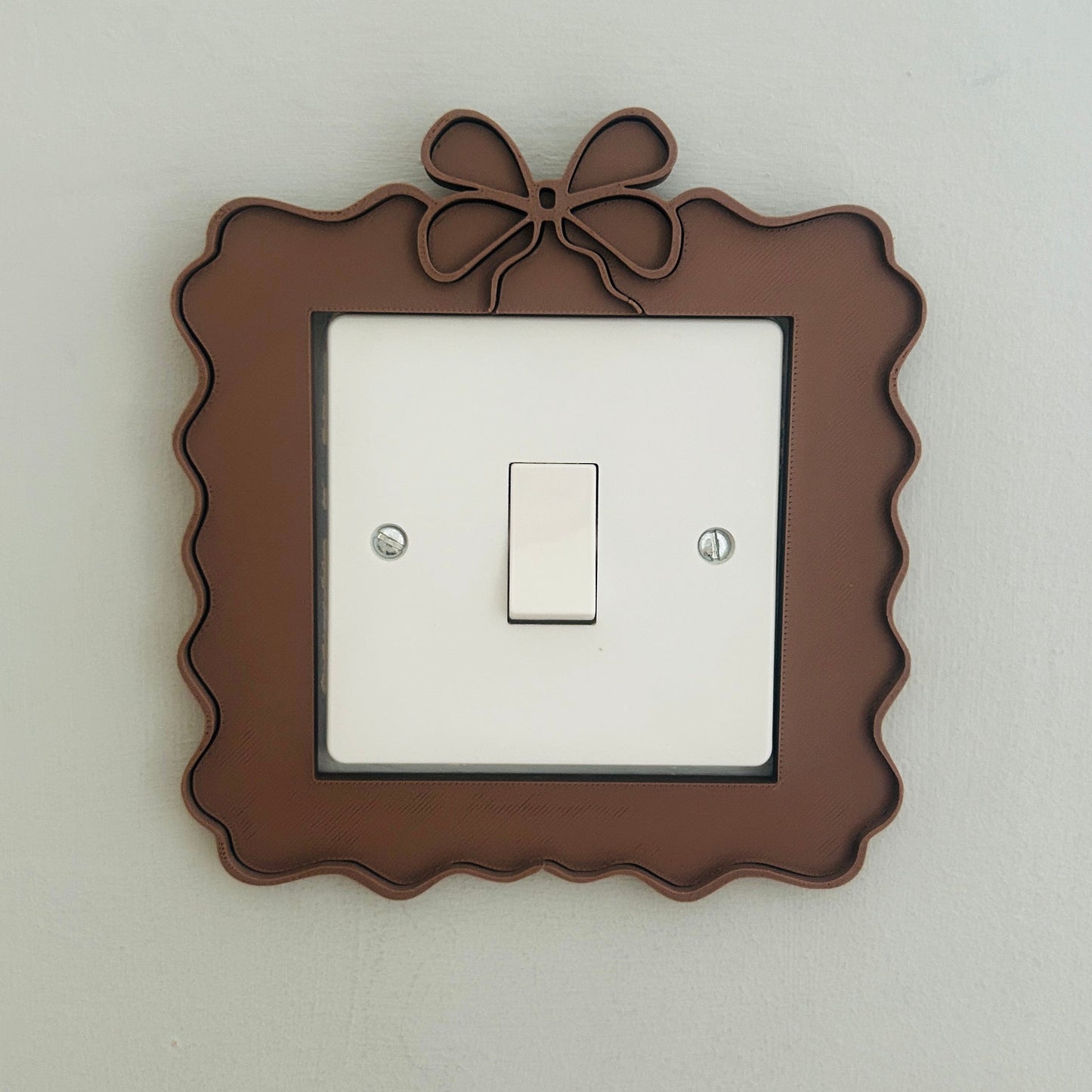 Bow Swirl Light Switch & Socket Surround